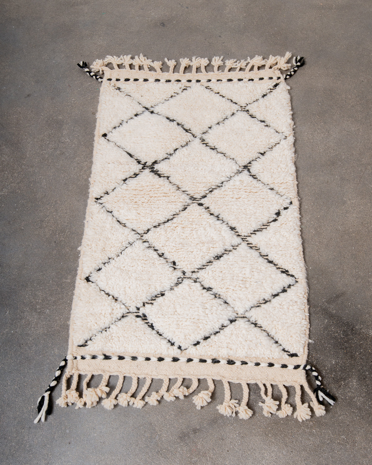 Modern, designer, handcrafted Berber rug from Morocco. Beniourain carpet with beautiful colours and patterns and fluffy wool texture.